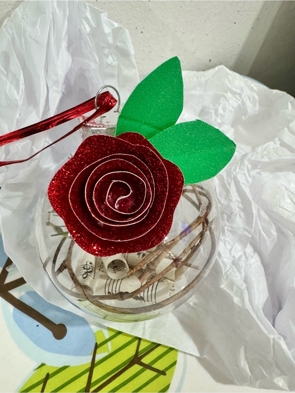 Sheet music & rose ornament